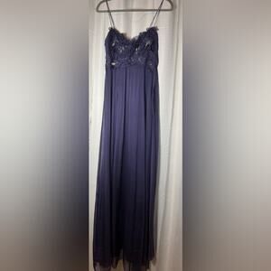 Rebecca Taylor purple long gown with hand beading details on the top .